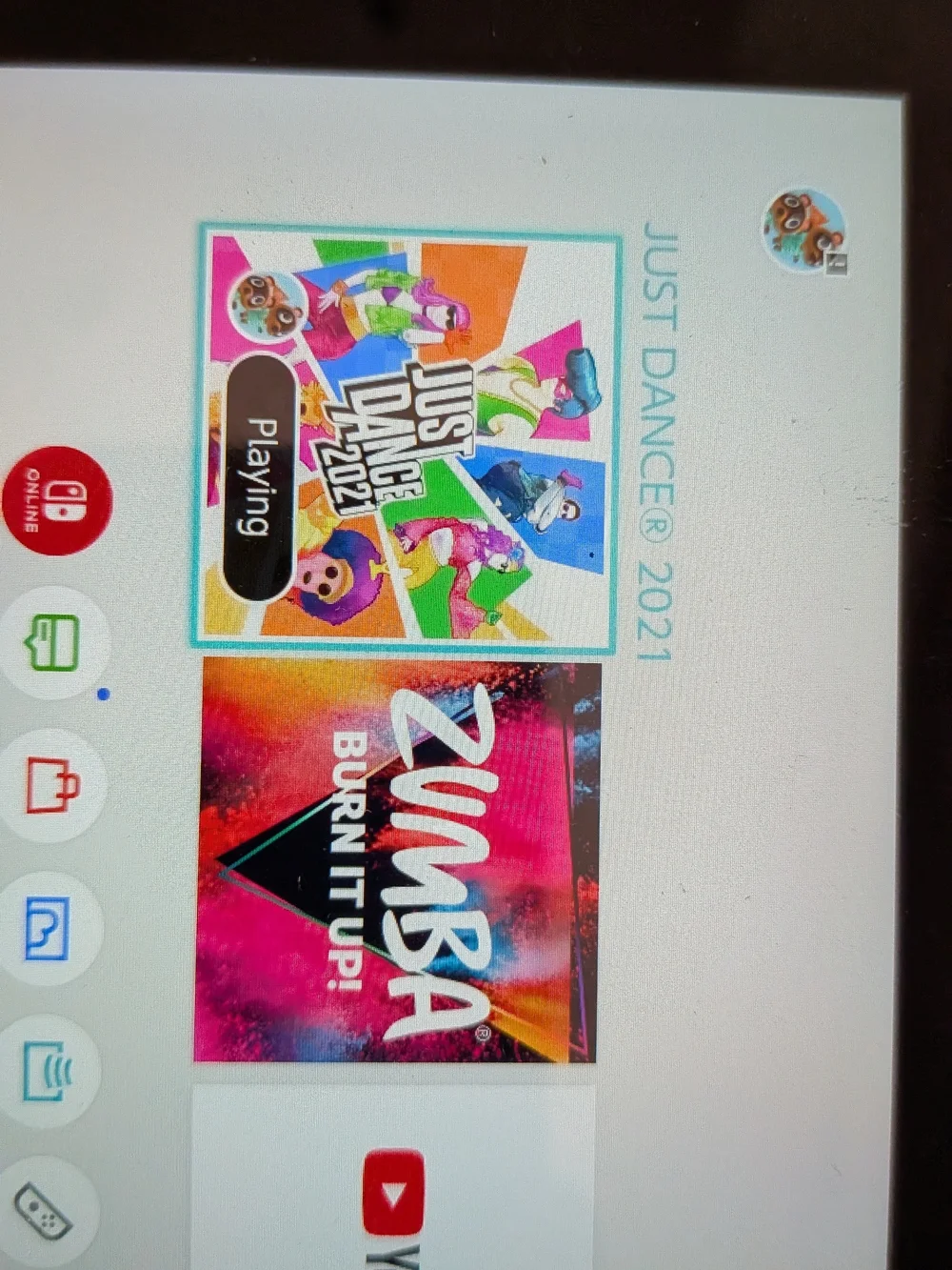 Nintendo Switch with Bright Turquoise and Cyan Joy-Con. Two Games Included